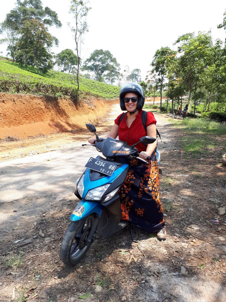 Driving on a scooter in the moutains of Cianjur.